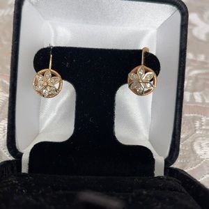 Gold diamonds and platinum earrings